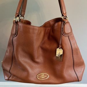 Coach Women’s tan vintage satchel purse